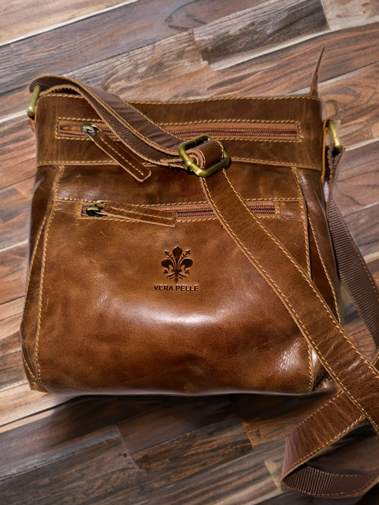 Cross body messenger for ladies made of exclusive crunch VT leather